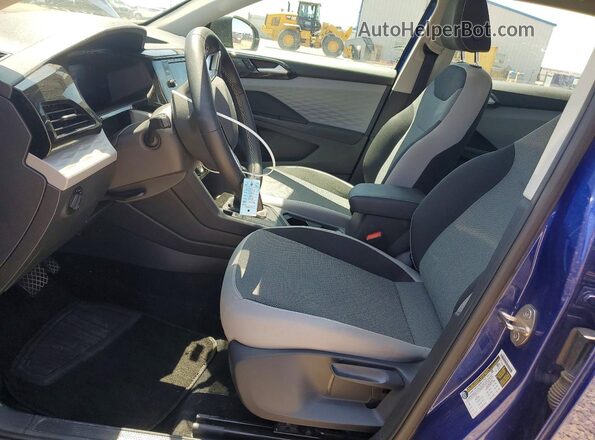3VVDX7B28PM347105 2023 VOLKSWAGEN TAOS Blue Vista interior delantera