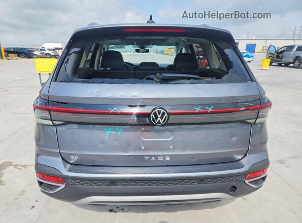 3VVEC7B2XSM069512 2025 VOLKSWAGEN TAOS Gray Widok z tyłu
