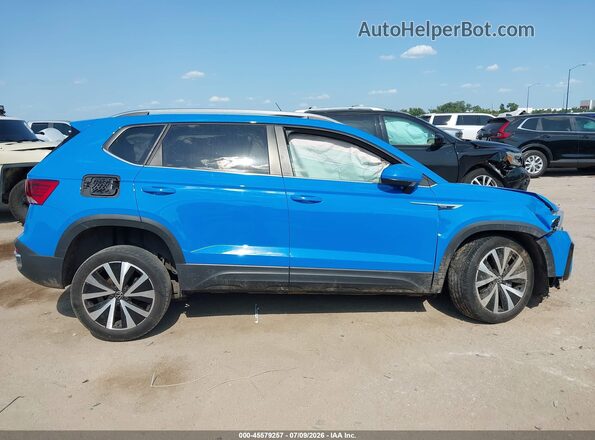 3VVEX7B27PM328016 2023 VOLKSWAGEN TAOS Blue Rear interior view