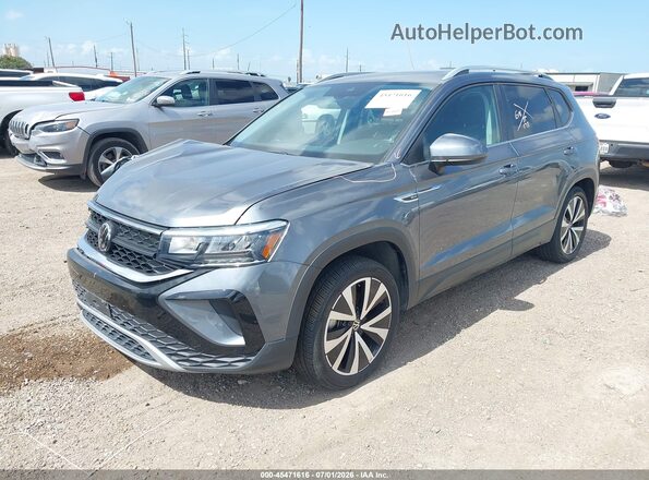 3VVEX7B28RM101596 2024 VOLKSWAGEN TAOS Gray Vista tres cuartos delantera izquierda
