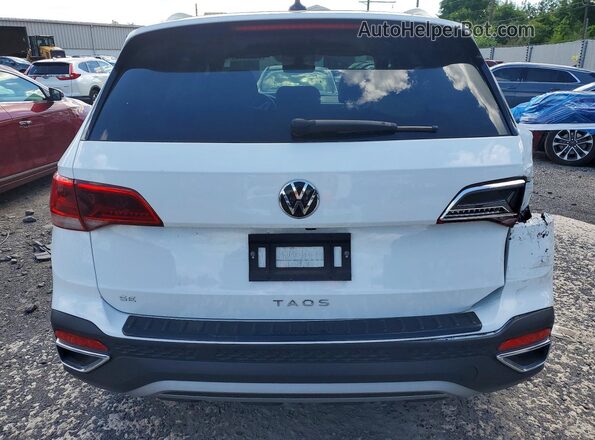3VVEX7B2XRM114687 2024 VOLKSWAGEN TAOS Белый Вид сзади