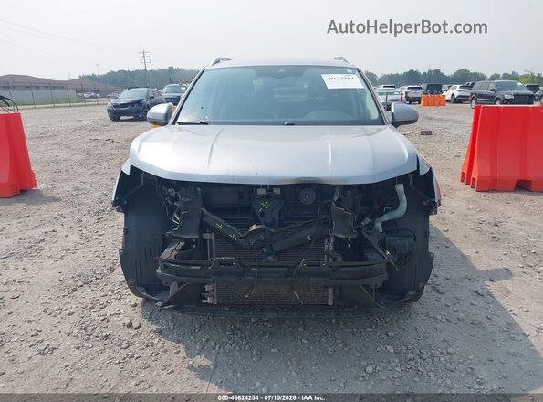 3VVJX7B23NM035841 2022 VOLKSWAGEN TAOS Silver Вид задньої частини салону