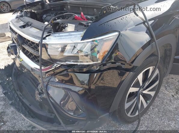 3VVLX7B25NM080756 2022 VOLKSWAGEN TAOS Black Widok z przodu
