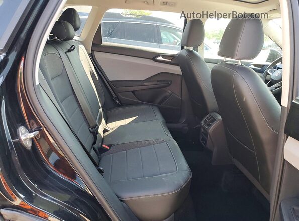 3VVLX7B26NM048849 2022 VOLKSWAGEN TAOS Black Vista interior trasera