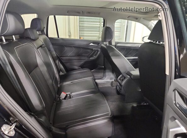 3VVMB7AX4RM170602 2024 VOLKSWAGEN TIGUAN Черный Вид задней части салона