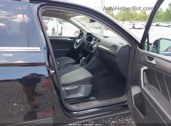 3VVNB7AX1RM164115 2024 VOLKSWAGEN TIGUAN Black Вид салону спереду