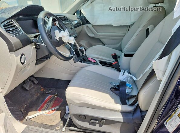 3VVNB7AX3PM024080 2023 VOLKSWAGEN TIGUAN Blue Vista interior delantera