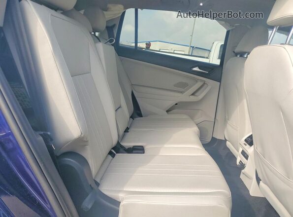 3VVNB7AX4PM040725 2023 VOLKSWAGEN TIGUAN Blue Vista interior trasera