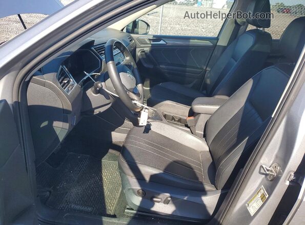 3VVNB7AX7PM128846 2023 VOLKSWAGEN TIGUAN Серебряный Вид салона спереди