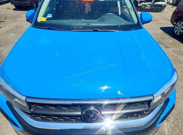 3VVNX7B23PM335934 2023 VOLKSWAGEN TAOS Blue Widok komory silnika