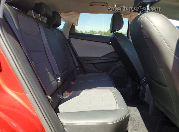 3VVNX7B24PM300609 2023 VOLKSWAGEN TAOS Red Rear interior view