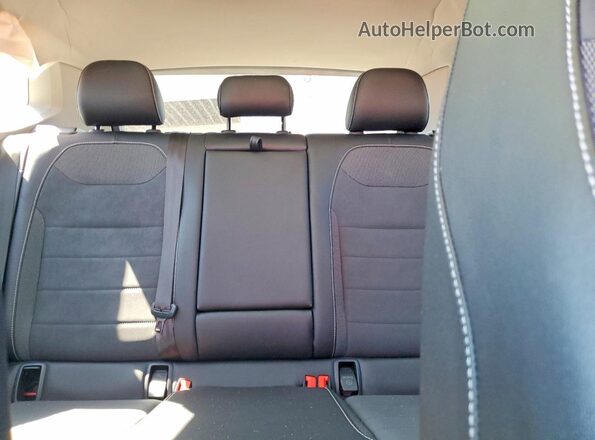 3VVNX7B24PM300609 2023 VOLKSWAGEN TAOS Red Rear seats view