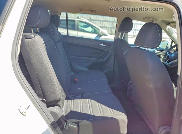 3VVRB7AX6PM112820 2023 VOLKSWAGEN TIGUAN White Vista interior trasera