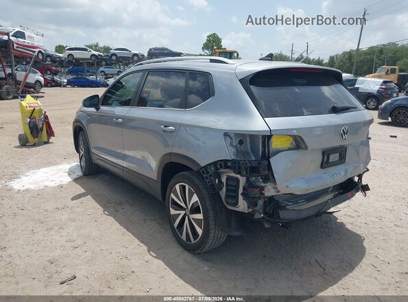 3VVRX7B22NM052083 2022 VOLKSWAGEN TAOS Silver Rear left