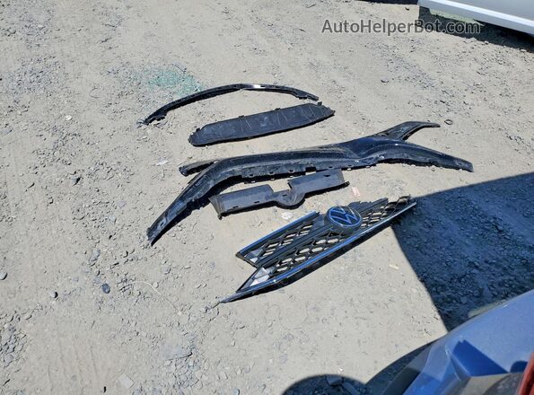 3VVSX7B21RM005599 2024 VOLKSWAGEN TAOS Silver Widok naklejki z numerem VIN