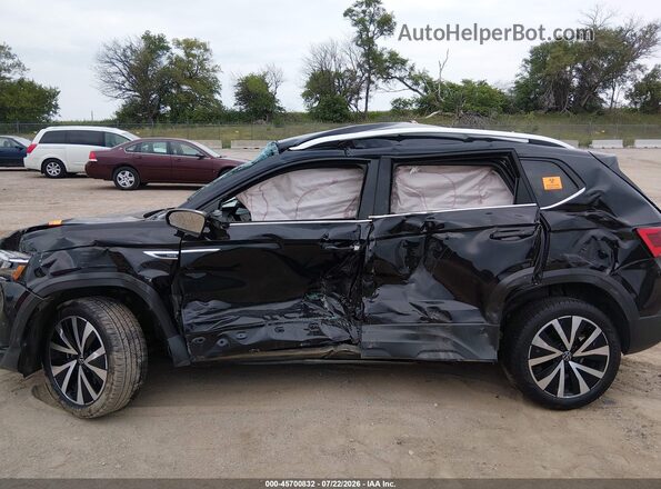 3VVSX7B26RM002102 2024 VOLKSWAGEN TAOS Black Front view