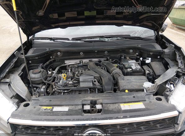 3VVSX7B26RM002102 2024 VOLKSWAGEN TAOS Black Rear view