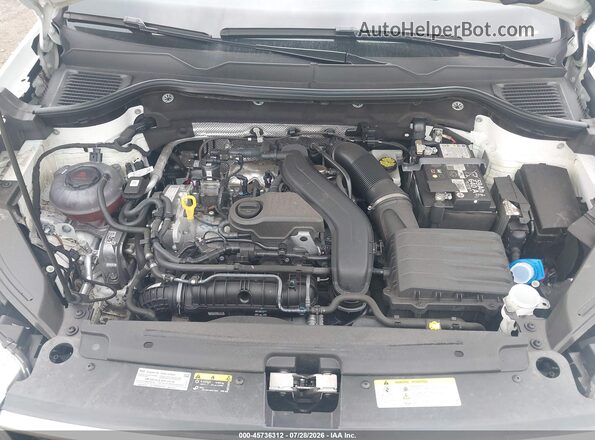 3VVUX7B22RM033033 2024 VOLKSWAGEN TAOS White Vista trasera