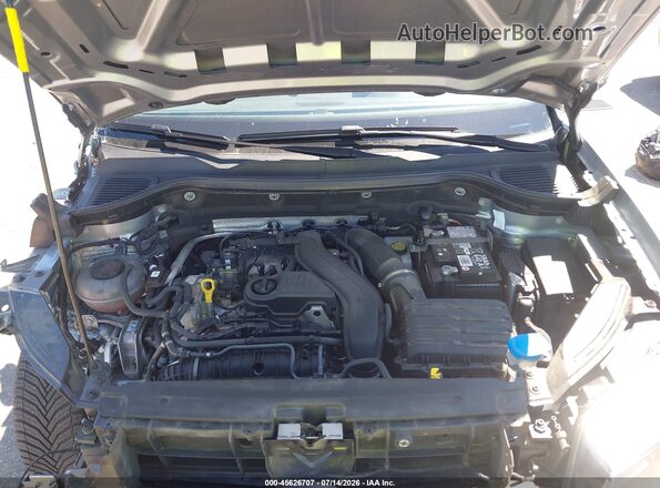 3VVUX7B22RM060894 2024 VOLKSWAGEN TAOS Silver Rear view