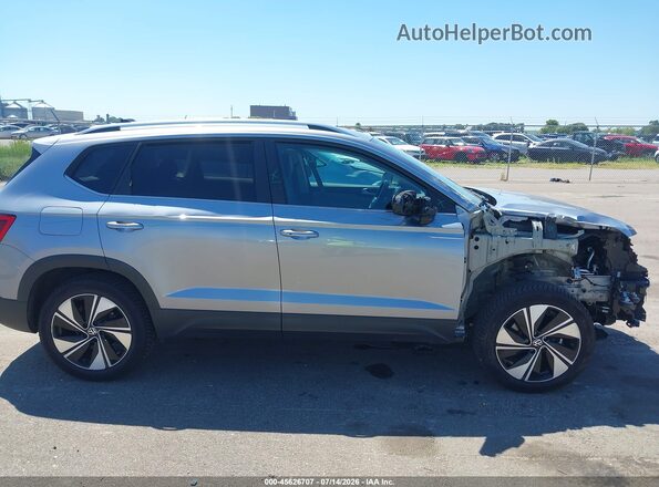 3VVUX7B22RM060894 2024 VOLKSWAGEN TAOS Silver Rear interior view