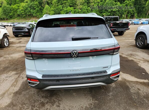 3VVVC7B27TM016378 2026 VOLKSWAGEN TAOS Синий Вид сзади