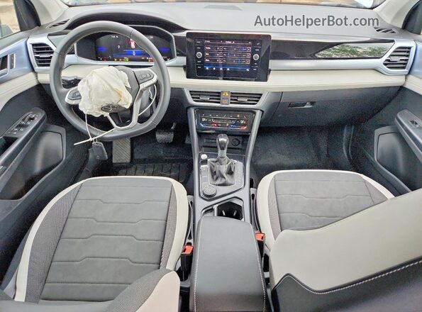 3VVVC7B27TM016378 2026 VOLKSWAGEN TAOS Синий Вид панели приборов