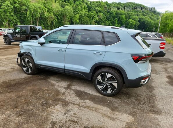 3VVVC7B27TM016378 2026 VOLKSWAGEN TAOS Синий Задняя левая четверть