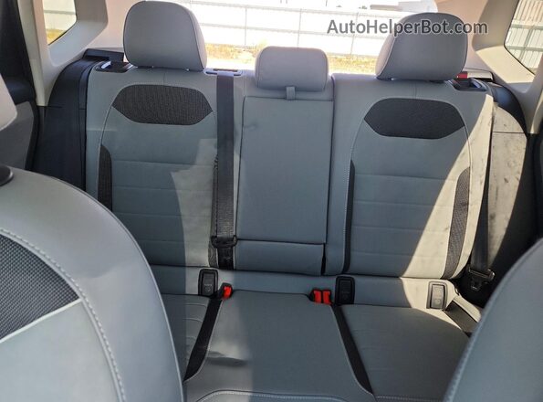 3VVVX7B2XRM072764 2024 VOLKSWAGEN TAOS Black Rear seats view