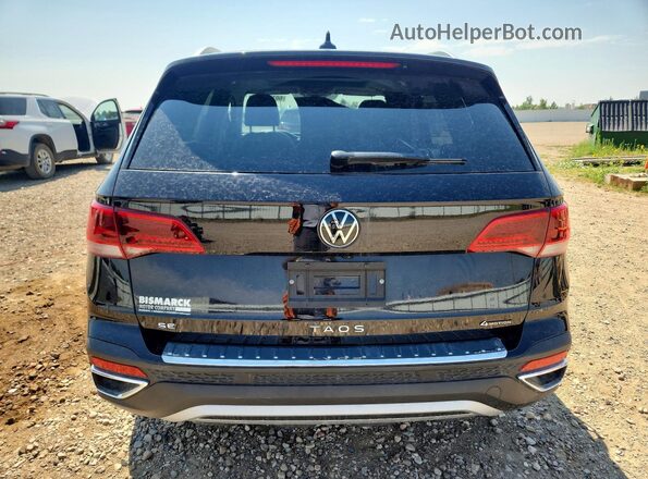 3VVVX7B2XRM072764 2024 VOLKSWAGEN TAOS Black Rear view