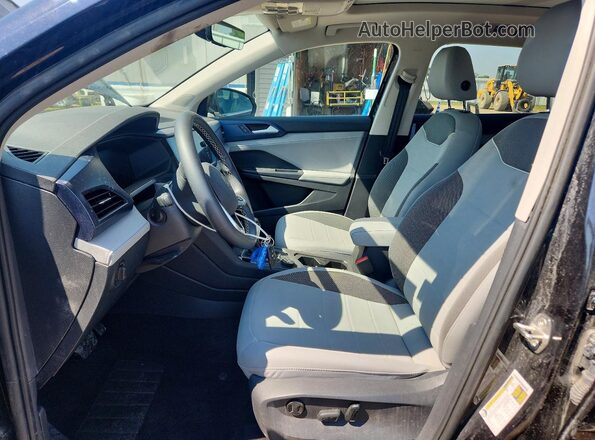 3VVVX7B2XRM072764 2024 VOLKSWAGEN TAOS Black Front interior view