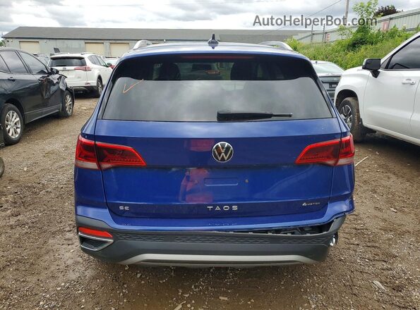 3VVWX7B2XNM042159 2022 VOLKSWAGEN TAOS Blue Vista trasera