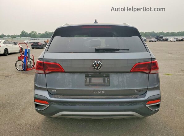 3VVYX7B2XPM303009 2023 VOLKSWAGEN TAOS Gray Vista trasera