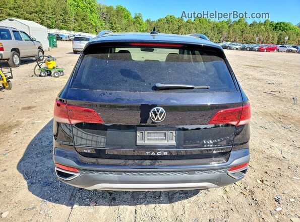 3VVYX7B2XPM350282 2023 VOLKSWAGEN TAOS Black Rear view