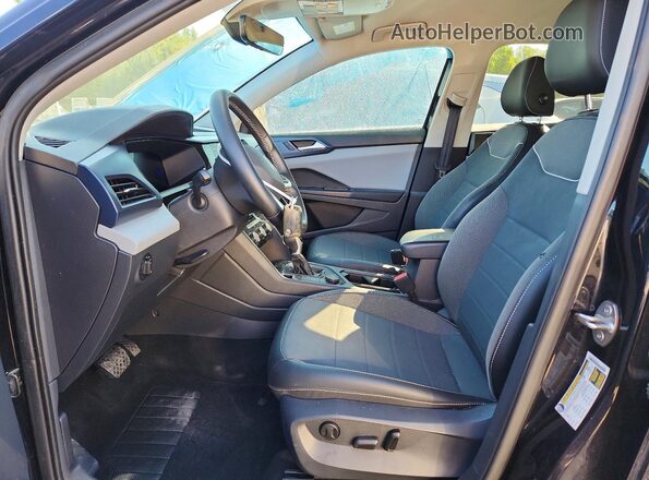 3VVYX7B2XPM350282 2023 VOLKSWAGEN TAOS Black Front interior view