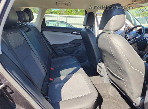 3VVYX7B2XPM350282 2023 VOLKSWAGEN TAOS Black Rear interior view