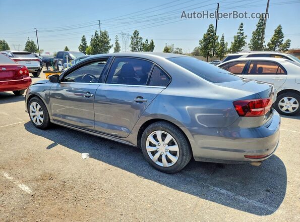 3VW2B7AJ0HM367652 2017 VOLKSWAGEN JETTA Gray Rear left