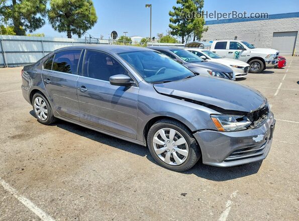 3VW2B7AJ0HM367652 2017 VOLKSWAGEN JETTA Gray Front right