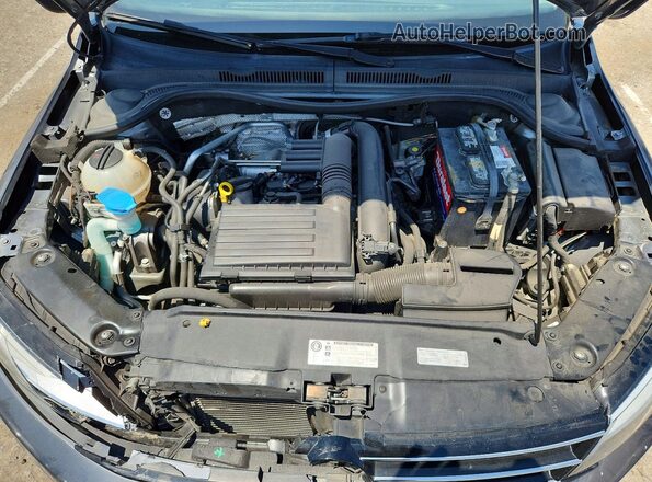 3VW2B7AJ0HM367652 2017 VOLKSWAGEN JETTA Gray Rear interior view