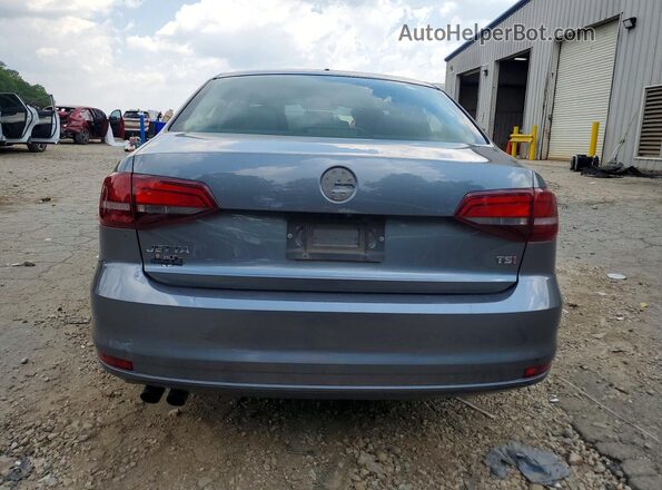 3VW2B7AJ1HM392852 2017 VOLKSWAGEN JETTA Серый Вид сзади