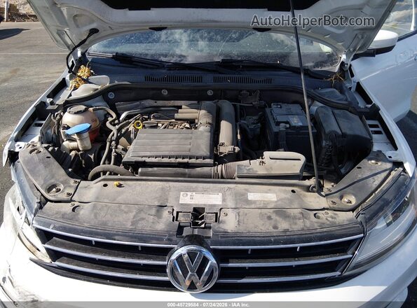 3VW2B7AJ1JM229236 2018 VOLKSWAGEN JETTA White Rear view