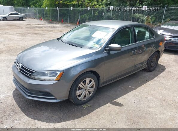 3VW2B7AJ2HM404832 2017 VOLKSWAGEN JETTA Gray Vista tres cuartos delantera izquierda