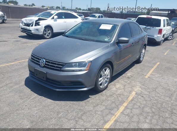 3VW2B7AJ2JM228161 2018 VOLKSWAGEN JETTA Gray Przód lewy