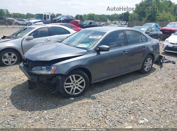 3VW2B7AJ2JM237216 2018 VOLKSWAGEN JETTA Gray Vista tres cuartos delantera izquierda