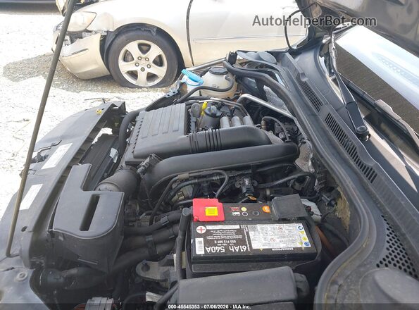 3VW2B7AJ2JM237216 2018 VOLKSWAGEN JETTA Gray Vista trasera