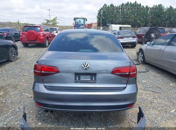 3VW2B7AJ2JM237216 2018 VOLKSWAGEN JETTA Gray 