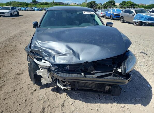 3VW2B7AJ3JM230260 2018 VOLKSWAGEN JETTA Серый Вид спереди