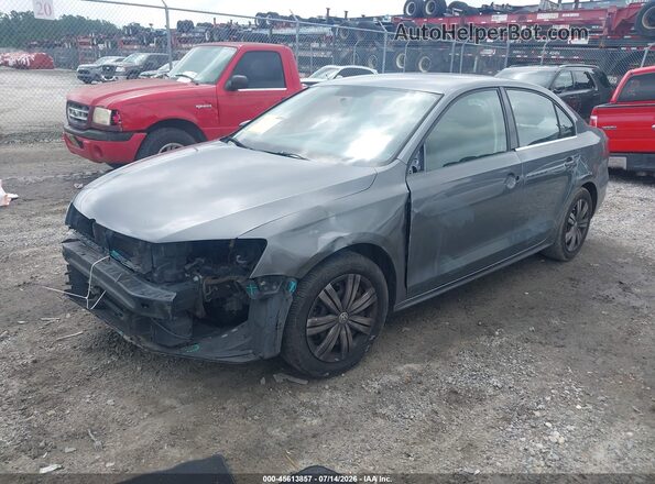 3VW2B7AJ4HM404377 2017 VOLKSWAGEN JETTA Gray Vista tres cuartos delantera izquierda