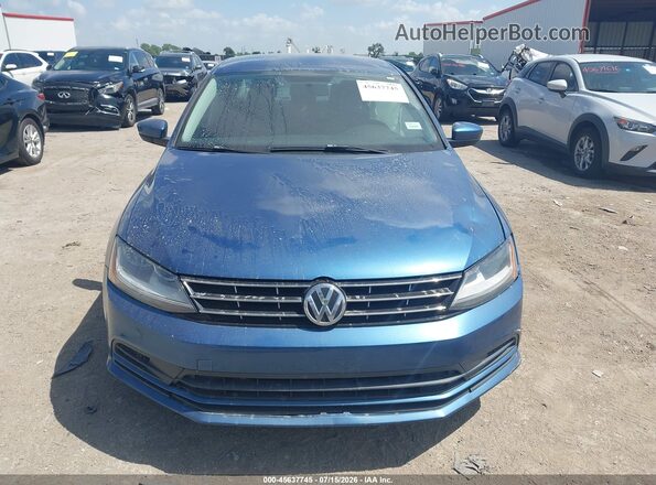 3VW2B7AJ6JM229801 2018 VOLKSWAGEN JETTA Blue Vista del salpicadero