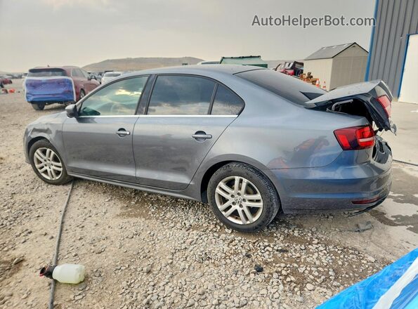 3VW2B7AJ8HM253074 2017 VOLKSWAGEN JETTA Gray Trasero izquierdo