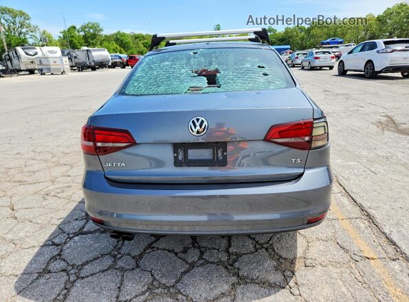 3VW2B7AJ8JM220730 2018 VOLKSWAGEN JETTA Gray Vista trasera